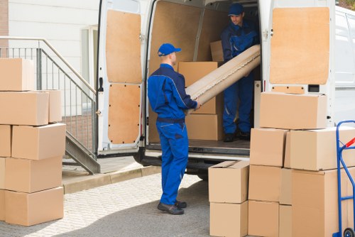 Local removals team handling a move in Coombe